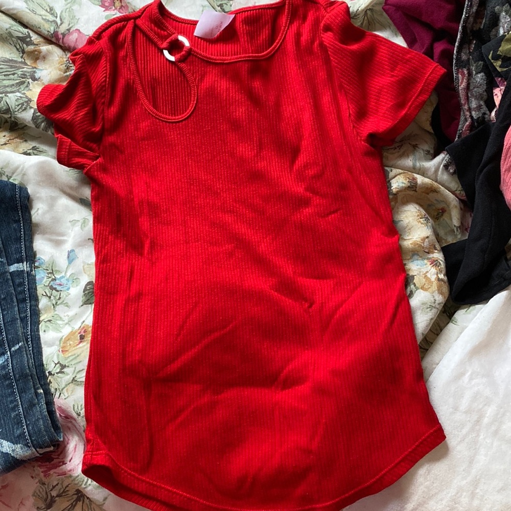 A red short sleeve shirt